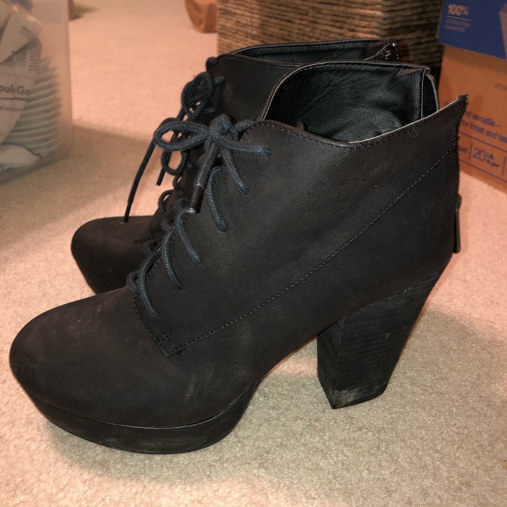 Black heeled lace up boots
